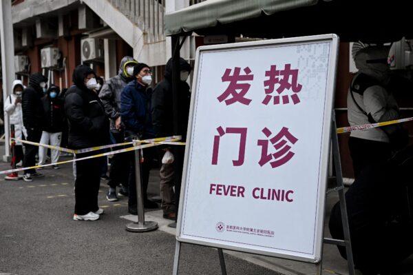 People line up at a fever clinic to be tested for COVID-19 in Beijing on Dec. 9, 2022. (NOEL CELIS/AFP via Getty Images)