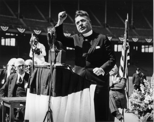Father Charles Coughlin delivers a radio speech, circa 1930s. (Fotosearch/Getty Images).
