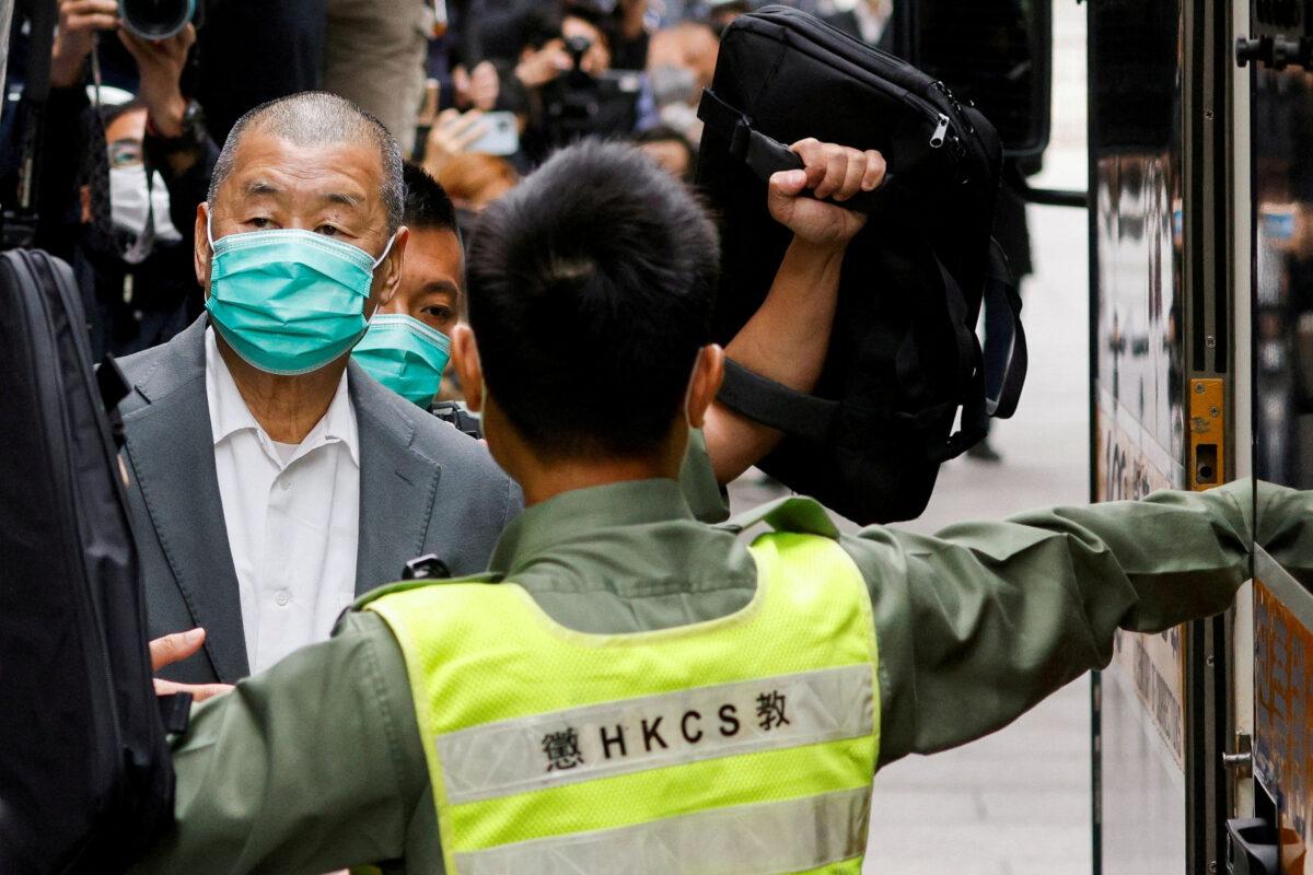 Media mogul Jimmy Lai, founder of Apple Daily, leaves the Court of Final Appeal by prison van in Hong Kong on Feb. 9, 2021. (Tyrone Siu/Reuters)