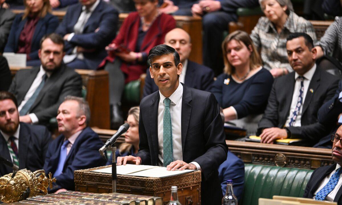 Handout photo issued by UK Parliament of Prime Minister Rishi Sunak making a statement to MPs in the House of Commons, London, on Dec. 13, 2022. (Jessica Taylor/UK Parliament via PA)