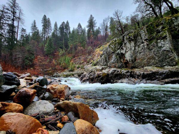 Winter whitewater rapids cascade through the Eldorado National Forest in northern California on the Route 50 heading into Carson City, Nev., on Dec. 10, 2022. (Allan Stein/The Epoch Times)