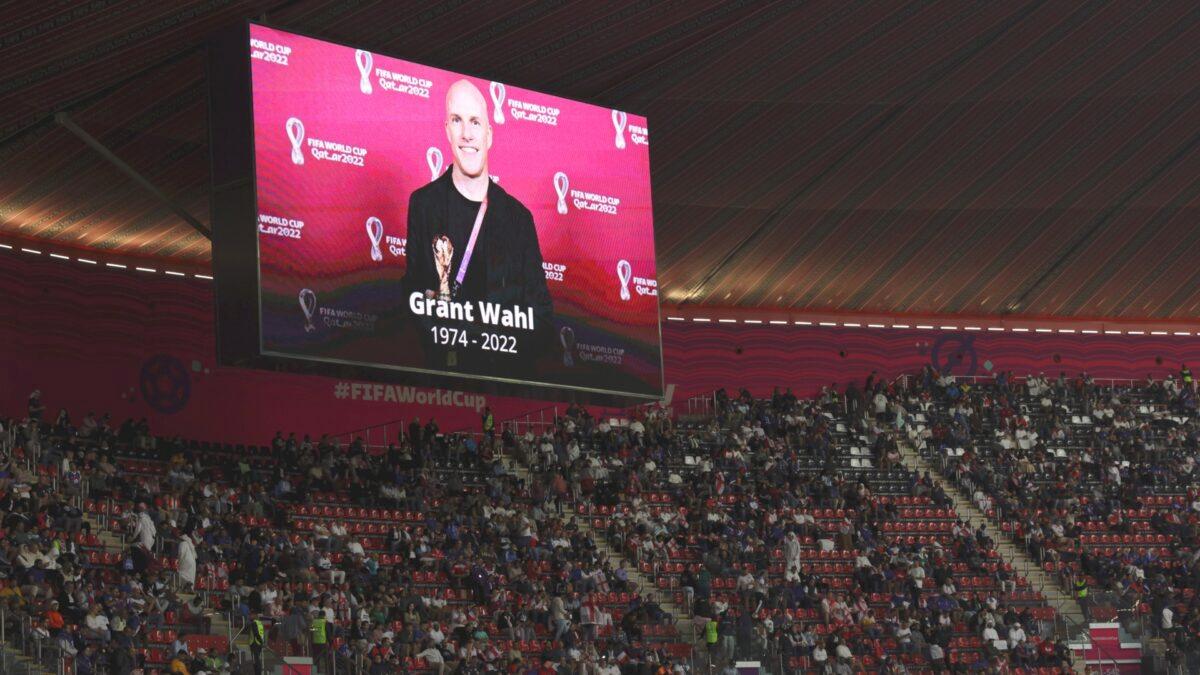The LED board shows a photo of Grant Wahl, an American sports journalist who passed away whilst reporting on the Argentina and Netherlands match, prior to the FIFA World Cup Qatar 2022 quarter-final match between England and France at Al Bayt Stadium in Al Khor, Qatar, on Dec. 10, 2022. (Clive Brunskill/Getty Images)