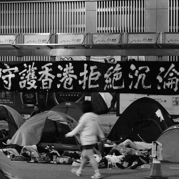 A banner printed with “Protect Hong Kong from Degradation” on display along the street during the 2014 Umbrella Movement, Nov. 2014 (Courtesy of Cheung Chan-fai)