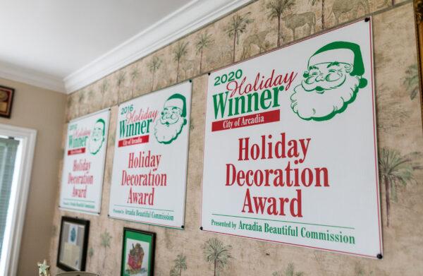 Awards for Christmas decor sit on display in James "Jim" Val's home in Arcadia, Calif., on Dec. 9, 2022. (John Fredricks/The Epoch Times)