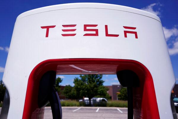 Tesla Supercharger at Willow Festival shopping plaza parking lot in Northbrook, Ill., on Aug. 10, 2022. (Nam Y. Huh/AP Photo)