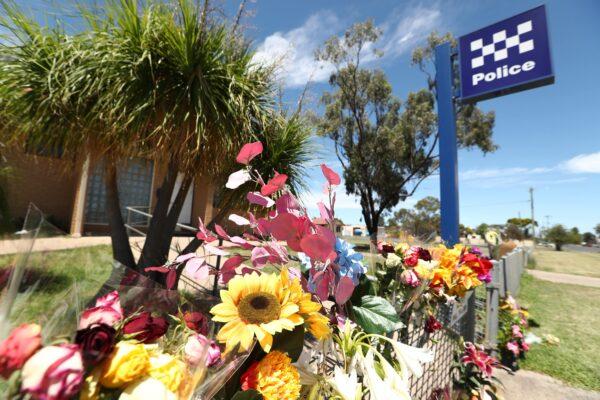 Tributes are seen at Tara Police Station in Tara, Queensland, Australia on Dec. 14, 2022. (AAP Image/Jason O’Brien)