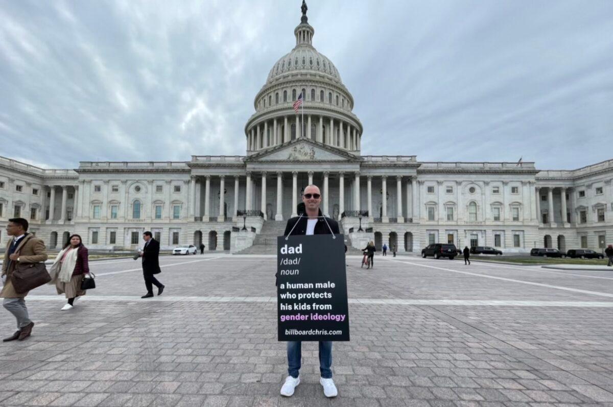 Activist Chris Elton carries a sign opposing gender ideology in Washington, DC in 2022. (Courtesy of Billboard Chris)
