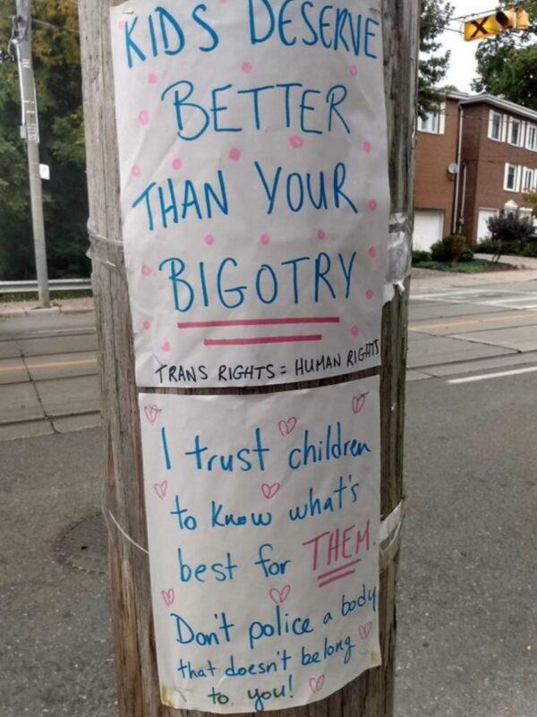A sign placed by pro-transgender activists protest activist Chris Elton in Toronto, Canada, in 2022. (Courtesy of Billboard Chris)