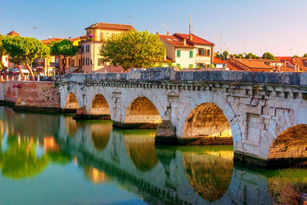 The Via Emilia starts in Rimini at the Ponte di Tiberio, a 2,000-year-old Roman bridge.(Dzmitrock/Shutterstock)