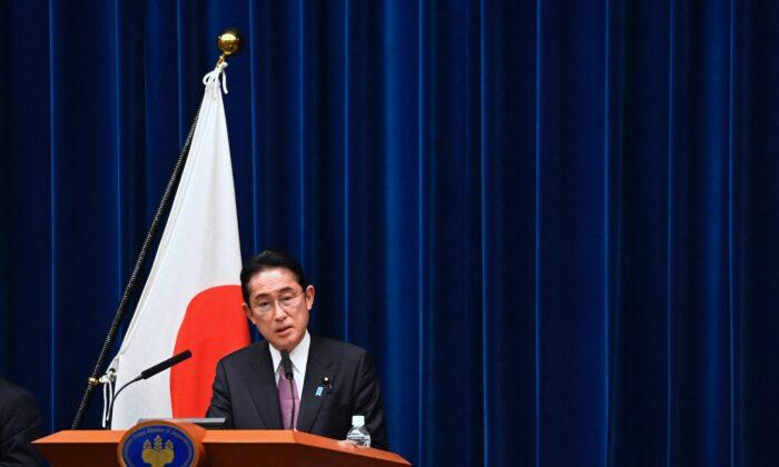 Japan Approves Tax Hikes For Defense Spending, But Defers Implementation