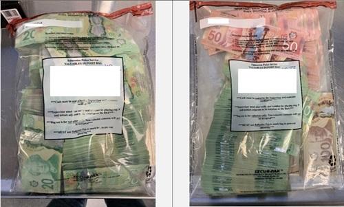 Cash seized from an alleged drug trafficking house in central Edmonton on Nov. 17, 2022. (Edmonton Police Service)