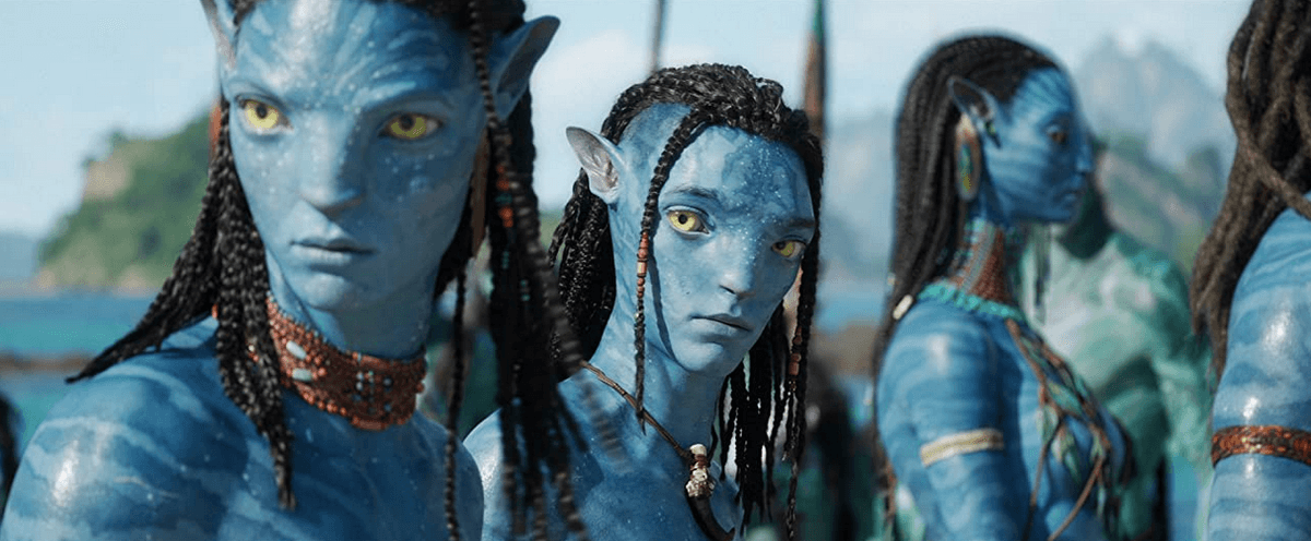 Sons of Sully: Older brother Neteyam (Jamie Flatters, L) and Lo'ak (Britain Dalton) try to fit in with the ways of their hosting tribe, the Metkayina, in "Avatar: The Way of Water." (20th Century Studios)