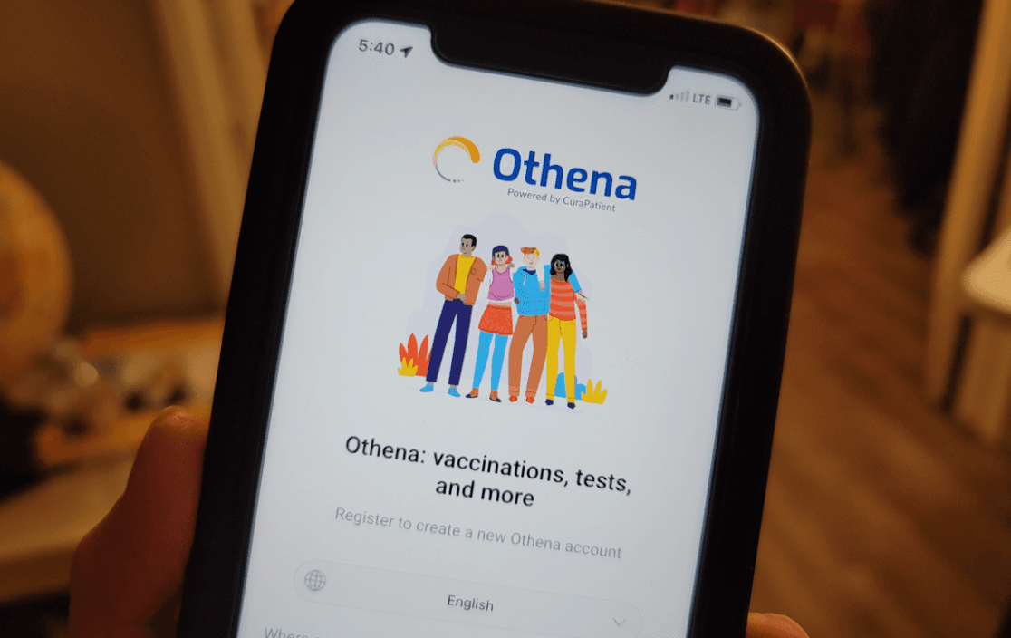 A person holds a phone looking at the Othena app in Arcadia, Calif., on Dec. 17, 2022. (Sarah Le/The Epoch Times)