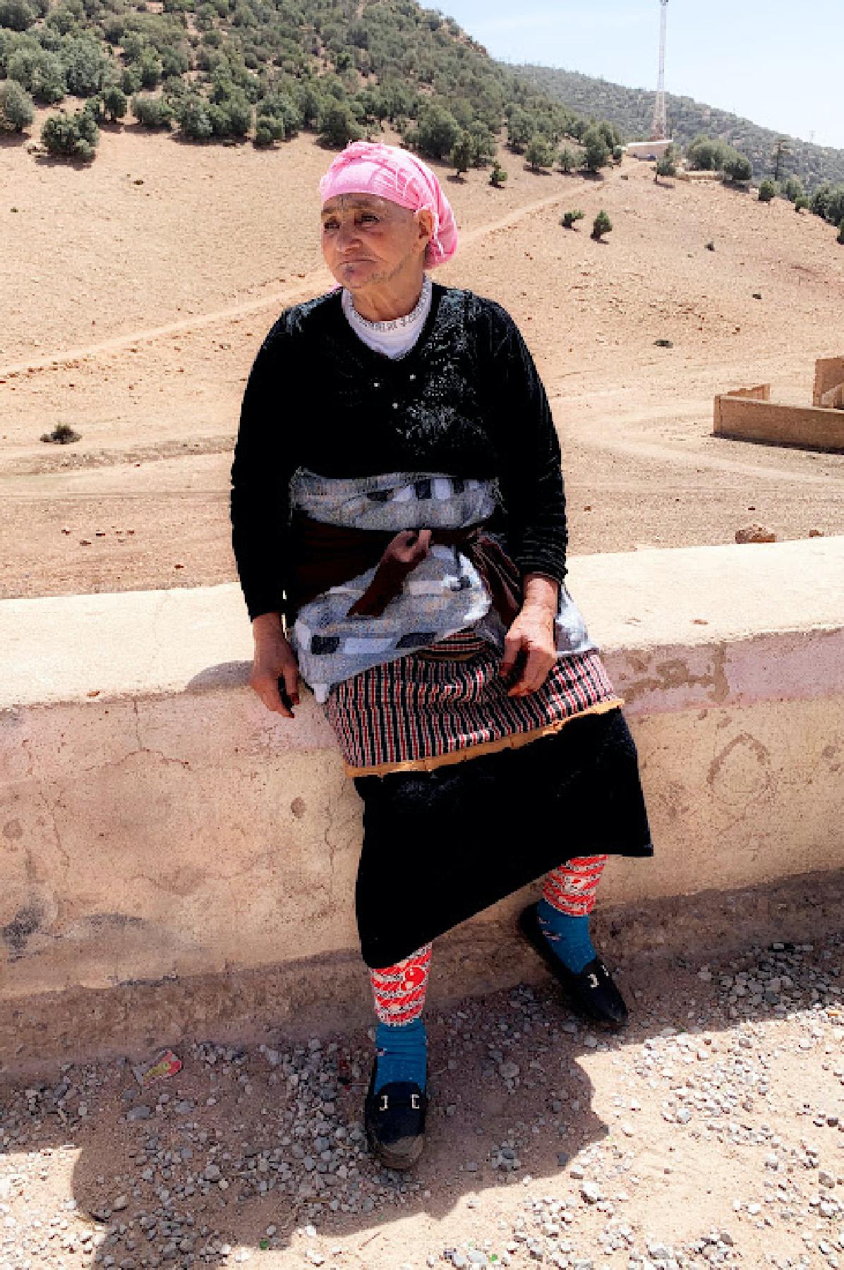 A Berber woman in Morocco visits with travelers who stop at her nomadic village. (Courtesy of Phil Allen)