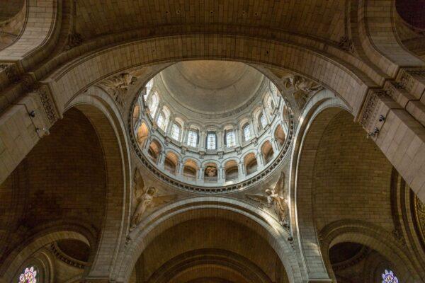Above the nave, a very high dome symbolizes the celestial world. The arched columns represent the passage between the terrestrial world (symbolized by the nave) and the celestial world. (<a href="https://www.shutterstock.com/g/rouslan">Gilmanshin</a>/<a href="https://www.shutterstock.com/image-photo/paris-france-march-26-2017-interior-627029876">Shutterstock</a>)