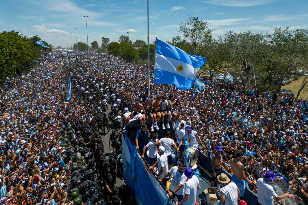 Millions Flood Buenos Aires as Argentina Soccer Team Airlifted in Choppers