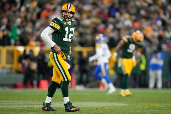 Aaron Rodgers (12) of the Green Bay Packers looks on during the game against the Los Angeles Rams at Lambeau Field in Green Bay, Wis., on December 19, 2022. (Patrick McDermott/Getty Images)