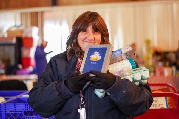 Mary Capobianco at the Easterseals Project Discovery food pantry in Port Jervis, N.Y., on Dec. 19, 2022. (Cara Ding/The Epoch Times)