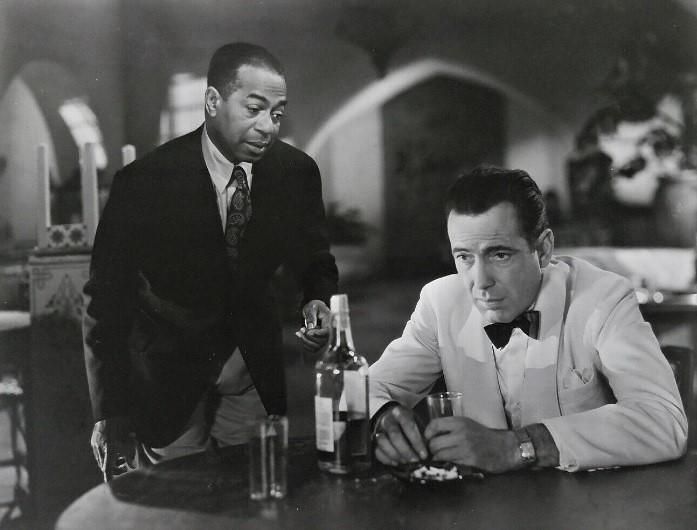 Dooley Wilson (left) and Humphrey Bogart in a "Casablanca" (1942) publicity still (cropped). (Public Domain)