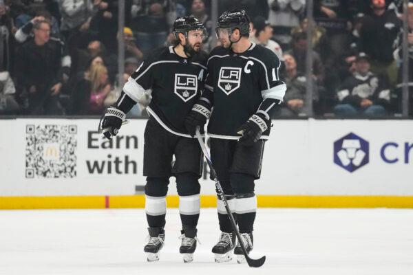 Los Angeles Kings defenseman Drew Doughty, left, celebrates with center Anze Kopitar (11) after scoring during the second period of an NHL hockey game against the Anaheim Ducks in Los Angeles on Dec. 20, 2022. (Ashley Landis/AP Photo)