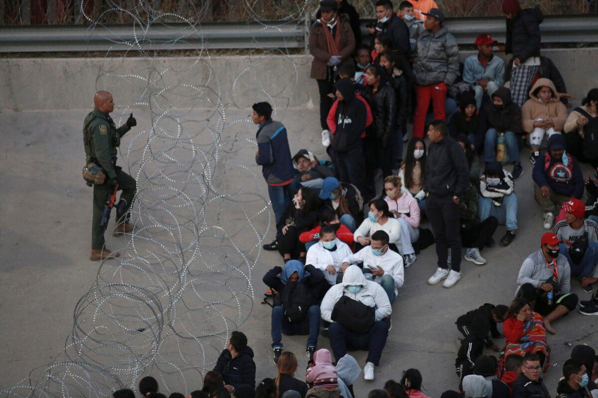 U.S. military prevent people from crossing illegally into El Paso, Texas, as seen from Ciudad Juarez, Mexico, on Dec. 20, 2022. (Christian Chavez/AP Photo)