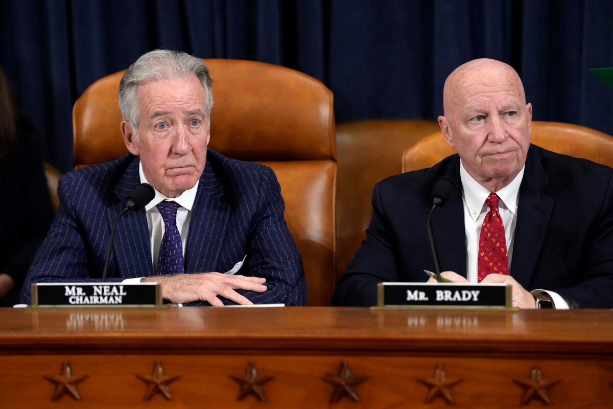 Rep. Richard Neal (D-Mass.) and Rep. Kevin Brady (R-Texas), the chairman and ranking member of the House Ways and Means Committee, during a meeting in Washington on Dec. 20, 2022. (Drew Angerer/Getty Images)