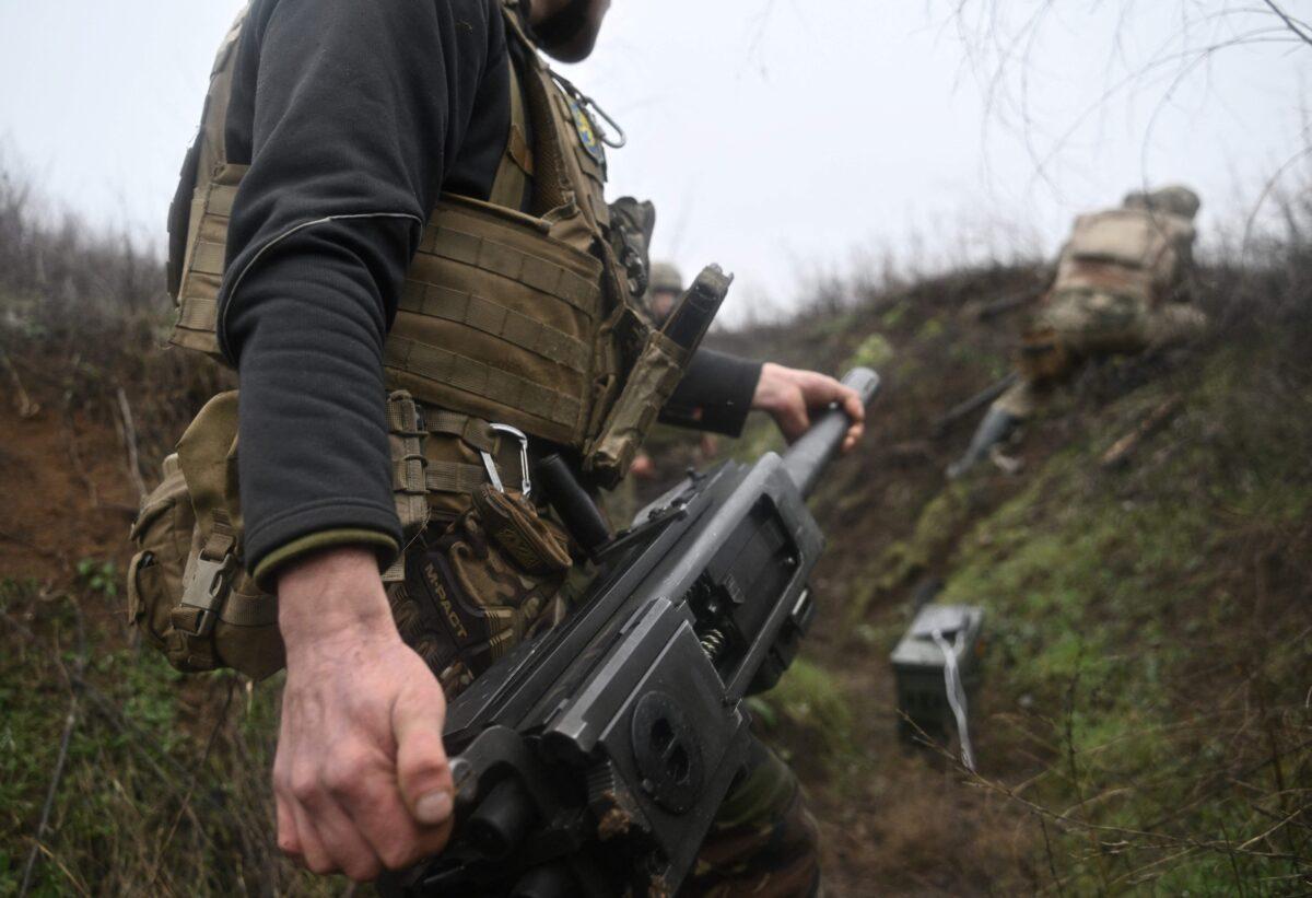Ukrainian servicemen prepare a U.S.-made MK-19 automatic grenade launcher in eastern Ukraine on Dec. 17, 2022. (Genya Savilov/AFP via Getty Images)