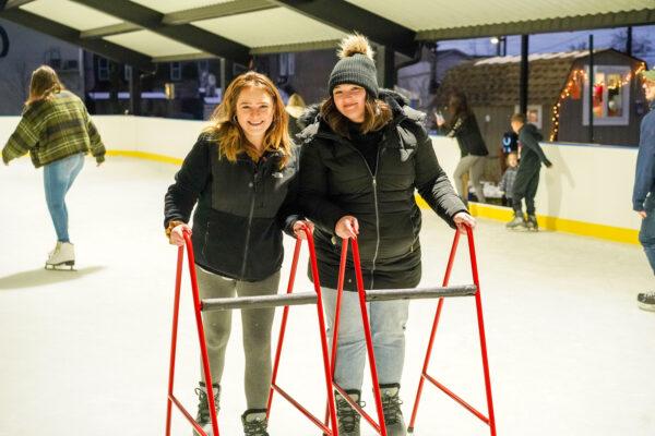 Local residents enjoy learning ice skating at the new ice rink at Erie Way Park in Middletown, N.Y., on Dec. 17, 2022. (Cara Ding/The Epoch Times)