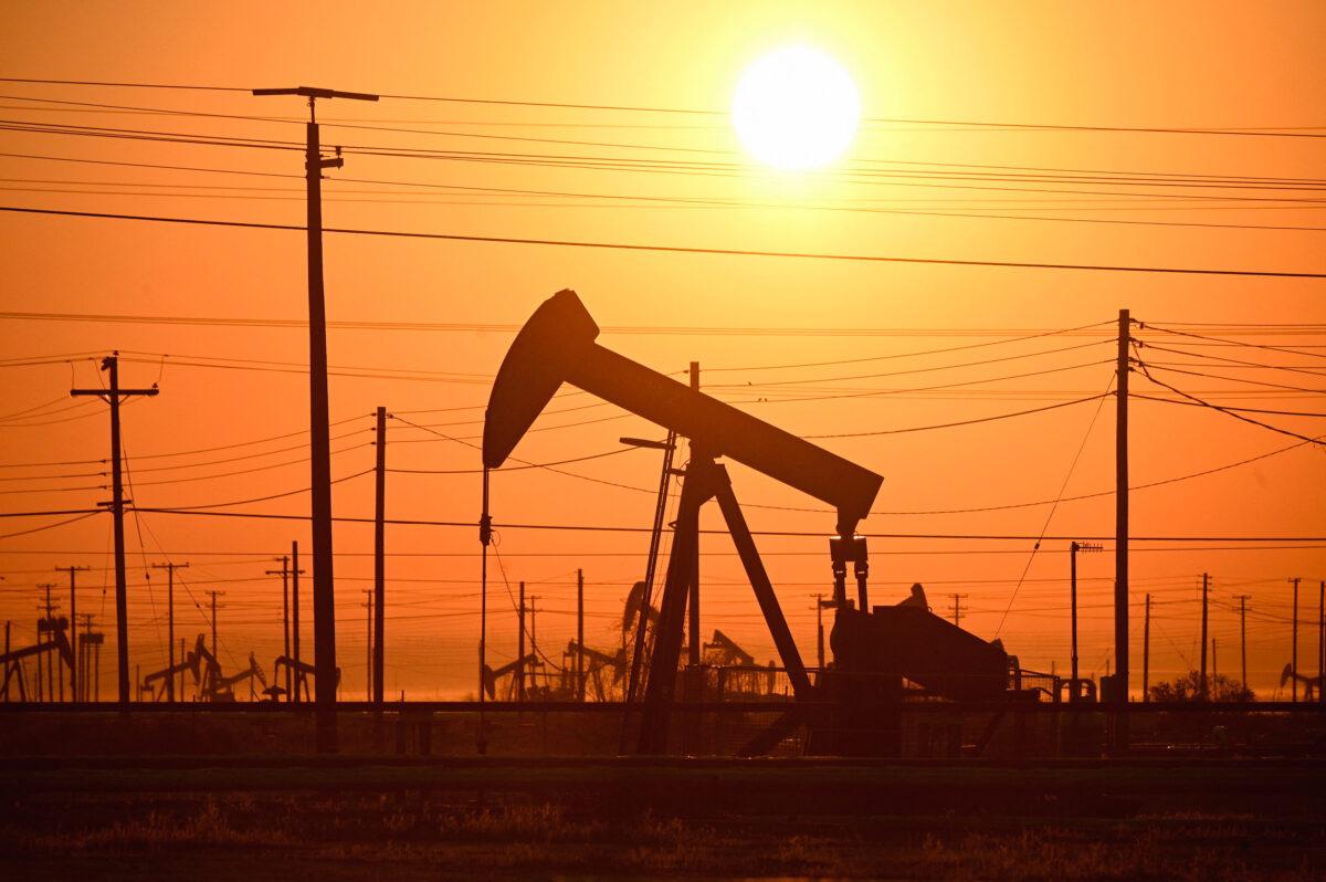 Oil pump jacks in California on Oct. 5, 2022. The OPEC+ alliance agrees to cut oil production by up to 2 million barrels per day, delivering a blow to President Joe Biden, who had asked the cartel to boost production to quell soaring inflation. (ROBYN BECK/AFP via Getty Images)
