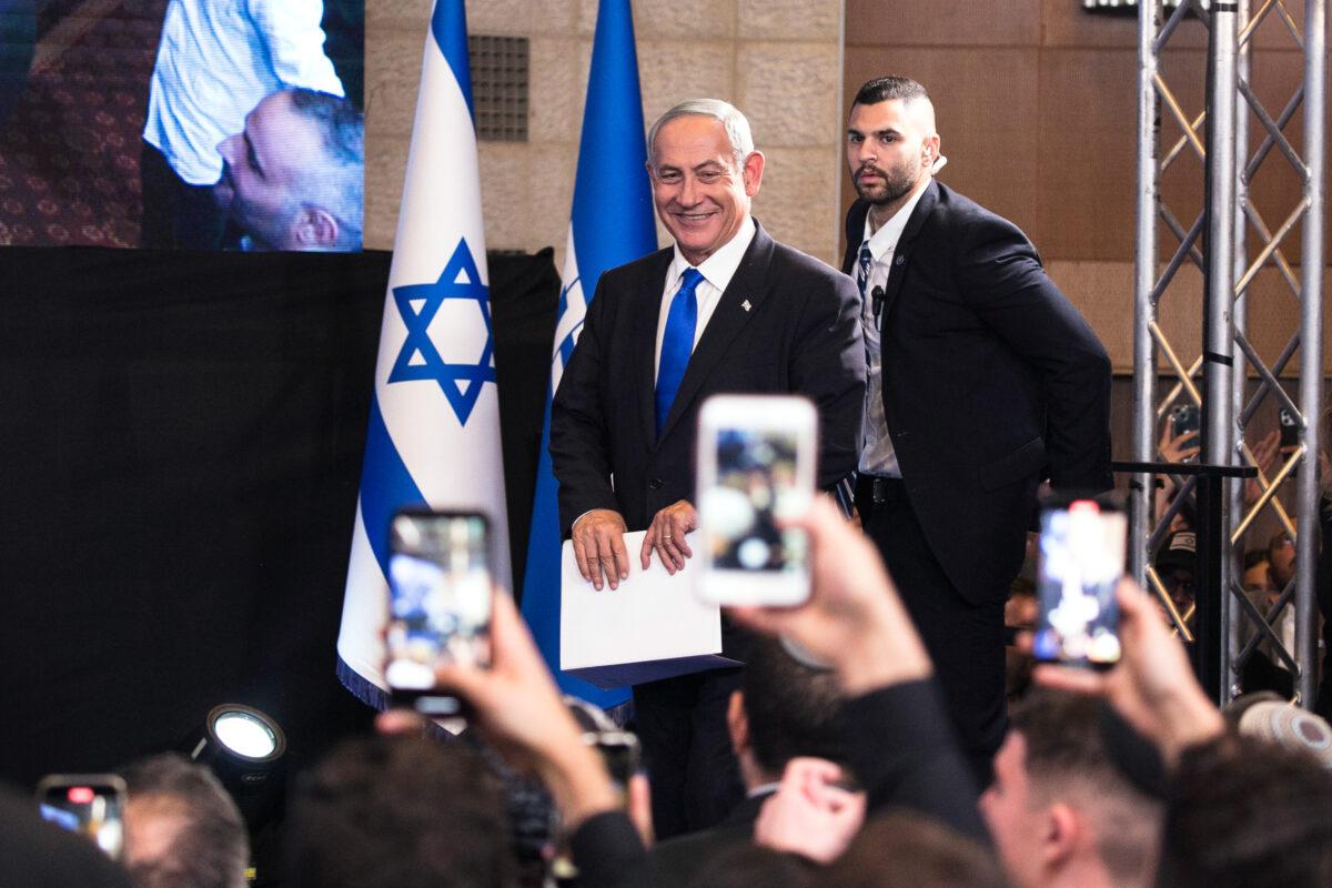 Benjamin Netanyahu’s bloc of political parties won a 64-seat majority in the Israeli Legislature, returning the Likud party leader to the nation’s helm as prime minister, on November 1. (Amir Levy/Getty Images)