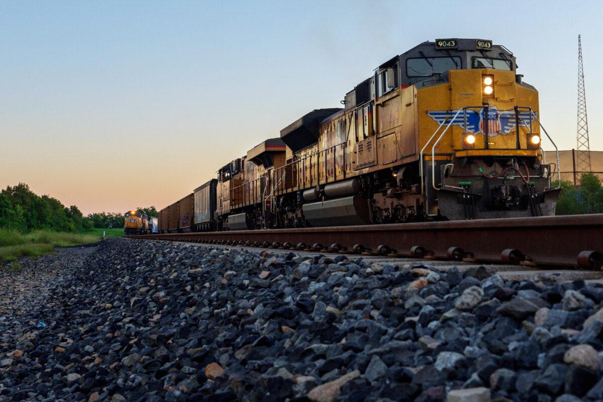 Freight trains travel through Houston on Sept. 14, 2022. Rail carriers across the country are cutting shipments and Amtrak has begun halting passenger routes as a national railroad strike looms. (Brandon Bell/Getty Images)