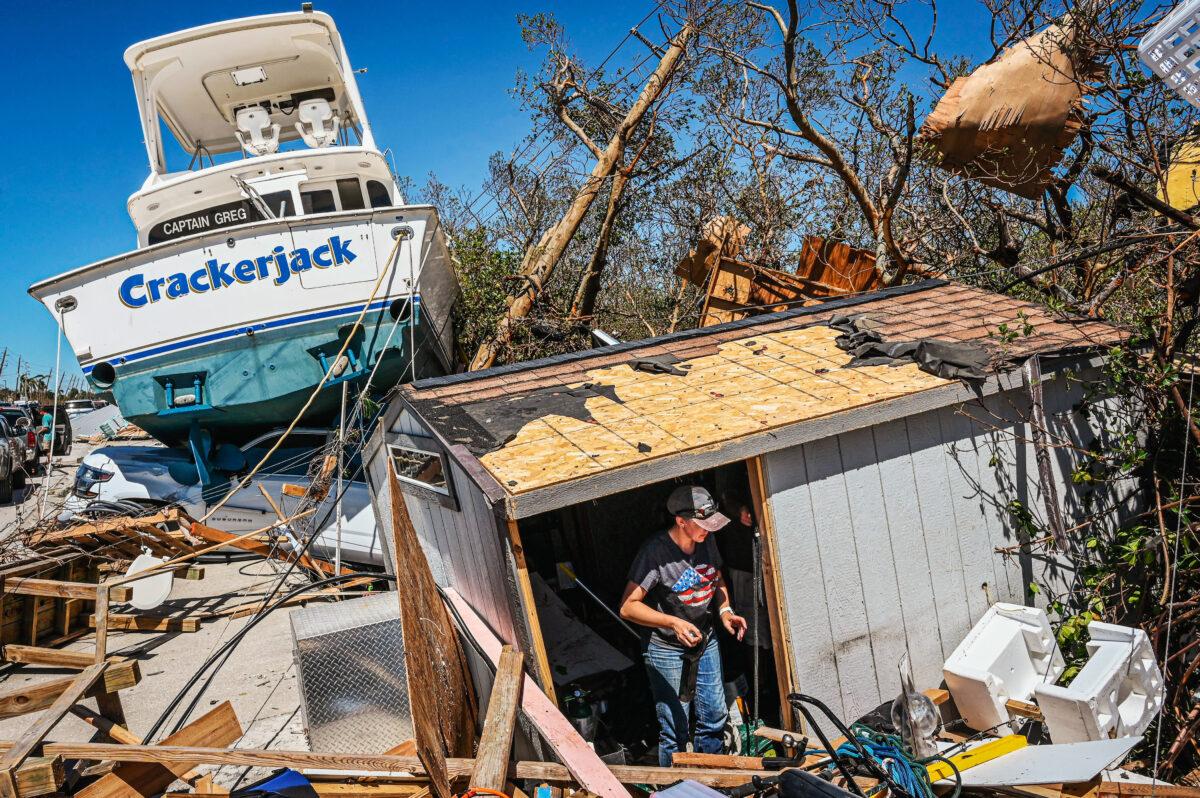 Florida begins a long cleanup on Sept. 30, 2022, after Hurricane Ian, a Category 4 storm that hit the state’s southwest three days prior, killing more than 100 people and inflicting $50 billion in insured losses. (GIORGIO VIERA/AFP via Getty Images)