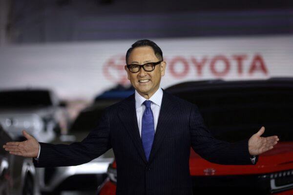 Toyota President Akio Toyoda gestures at a briefing on electric vehicle battery strategies at the company's showroom in Tokyo on Dec. 14, 2021. (Behrouz Mehri/AFP via Getty Images)