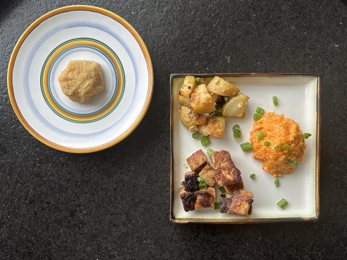 A trio of white miso dishes: miso-marinated fried tofu with ginger and garlic, miso butter baked potatoes, and mashed sweet potatoes with miso butter. (Ari LeVaux)