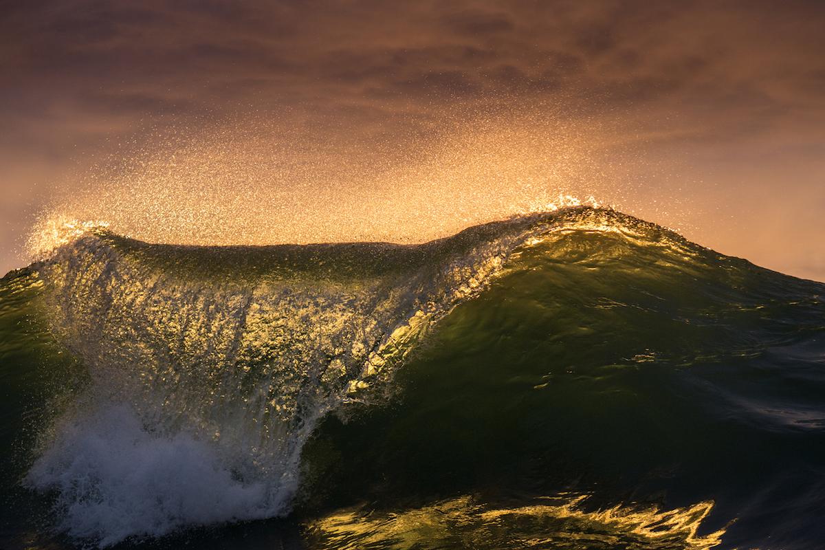 A sublime wave folds over as the morning sunlight passes through it. (Courtesy of <a href="https://www.instagram.com/orangerocks.za/">Terence Pieters</a>)