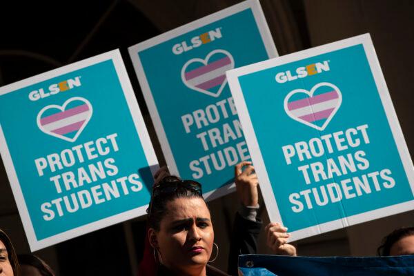 LGBT activists and their supporters rally in support of transgender people on the steps of New York City Hall, on Oct. 24, 2018, in New York City. (Drew Angerer/Getty Images)