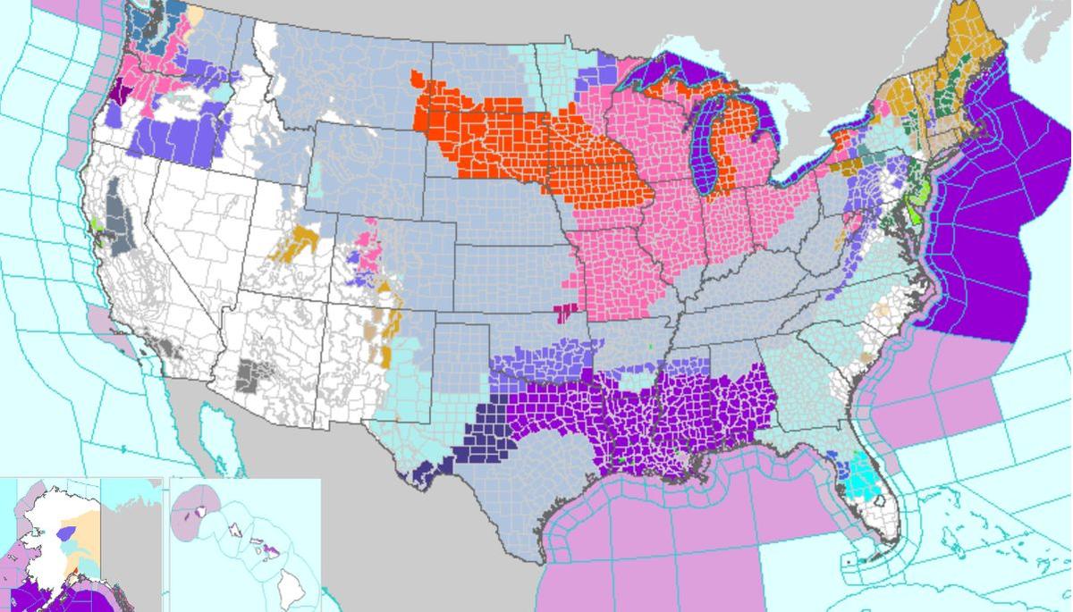 Winter storm and blizzard warnings were issued for millions of Americans on Dec. 22 as a winter storm brought harsh conditions and heavy snow across the Midwest and Plains regions. Regions shaded in orange are under blizzard warnings, while regions shaded in pink are under winter storm warnings. (NWS)