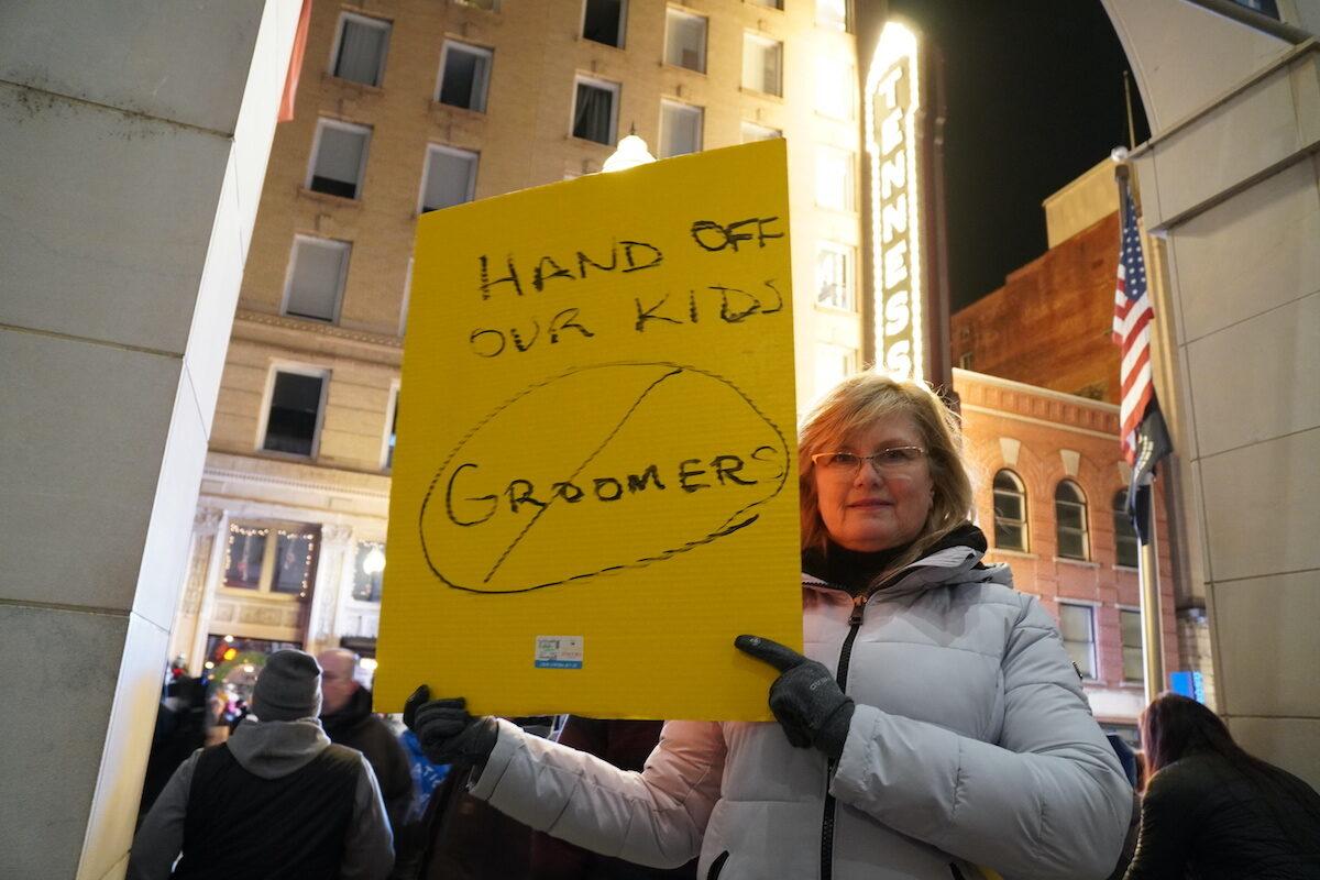 Mary Jane Olhasso protests a drag show accessible to children on the street outside the Tennessee Theatre in Knoxville, Tenn., on Dec. 22, 2022. (Jackson Elliott/The Epoch Times)
