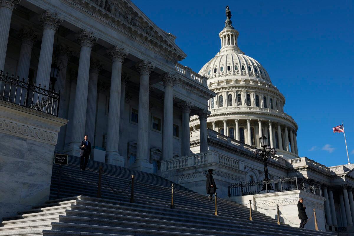 U.S. Capitol police officers stand on the steps to the House as House members vote on a $1.7 trillion spending package in Washington on Dec. 23, 2022. The House of Representatives voted to pass the spending bill that will fund the government through 2023. (Anna Moneymaker/Getty Images)