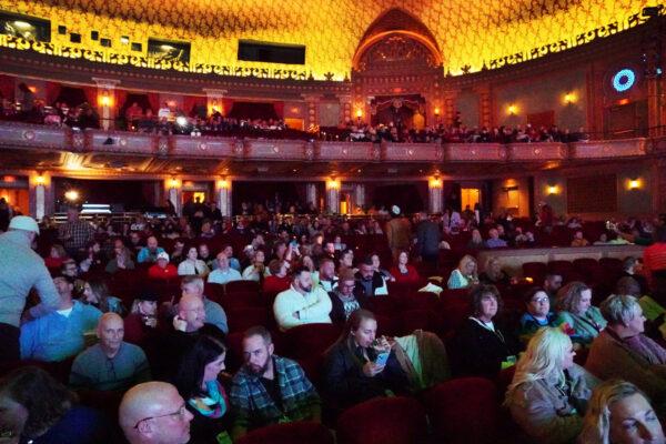 Audience members gather in the Tennessee Theatre to watch "A Drag Queen Christmas" show in Knoxville, Tenn., on Dec. 22, 2022. (Jackson Elliott/The Epoch Times)
