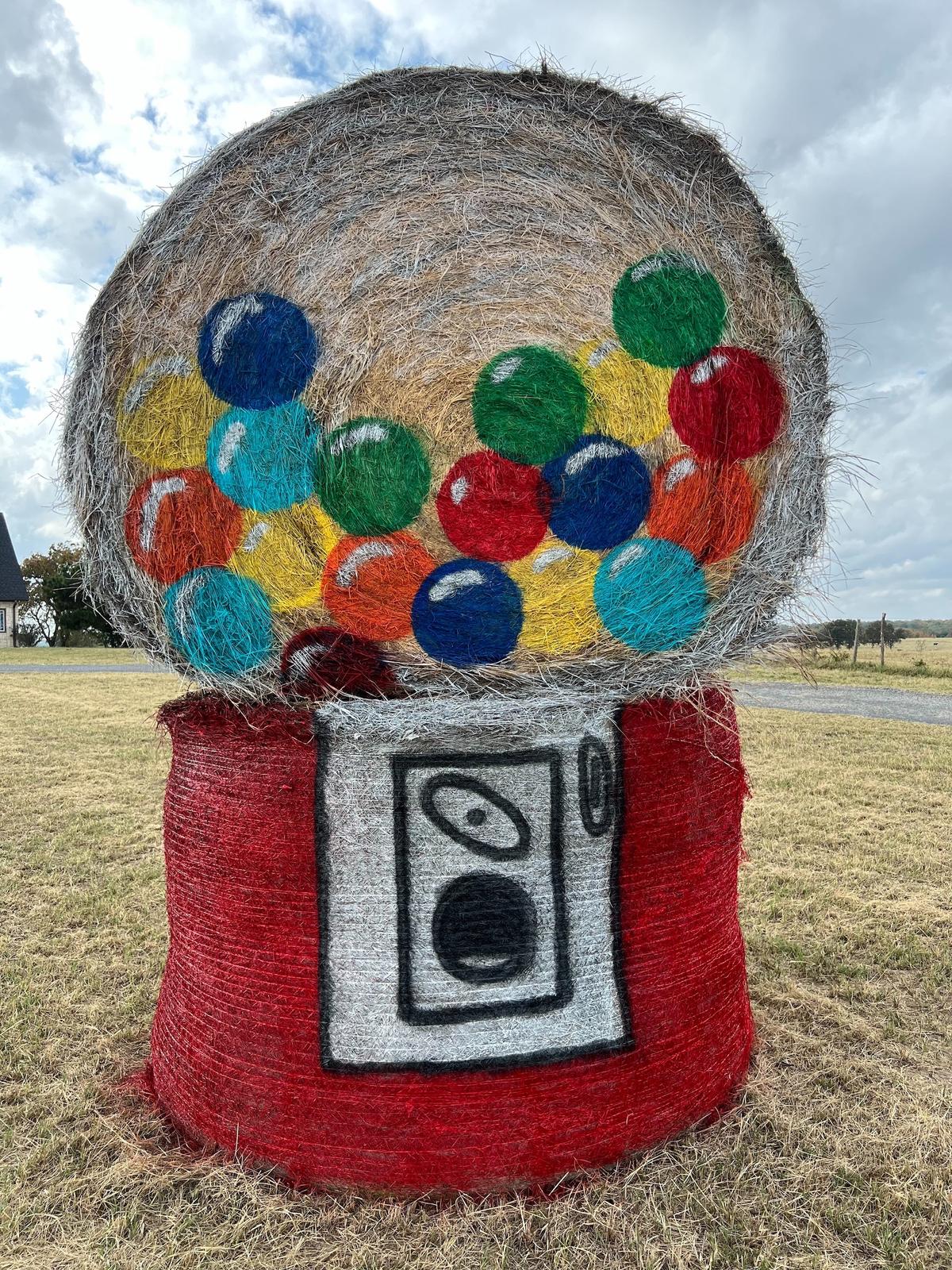 The hay bale sculpture of a gumball machine. (Courtesy of <a href="https://www.facebook.com/groups/320200669469831/">Melissa Kelley</a>)