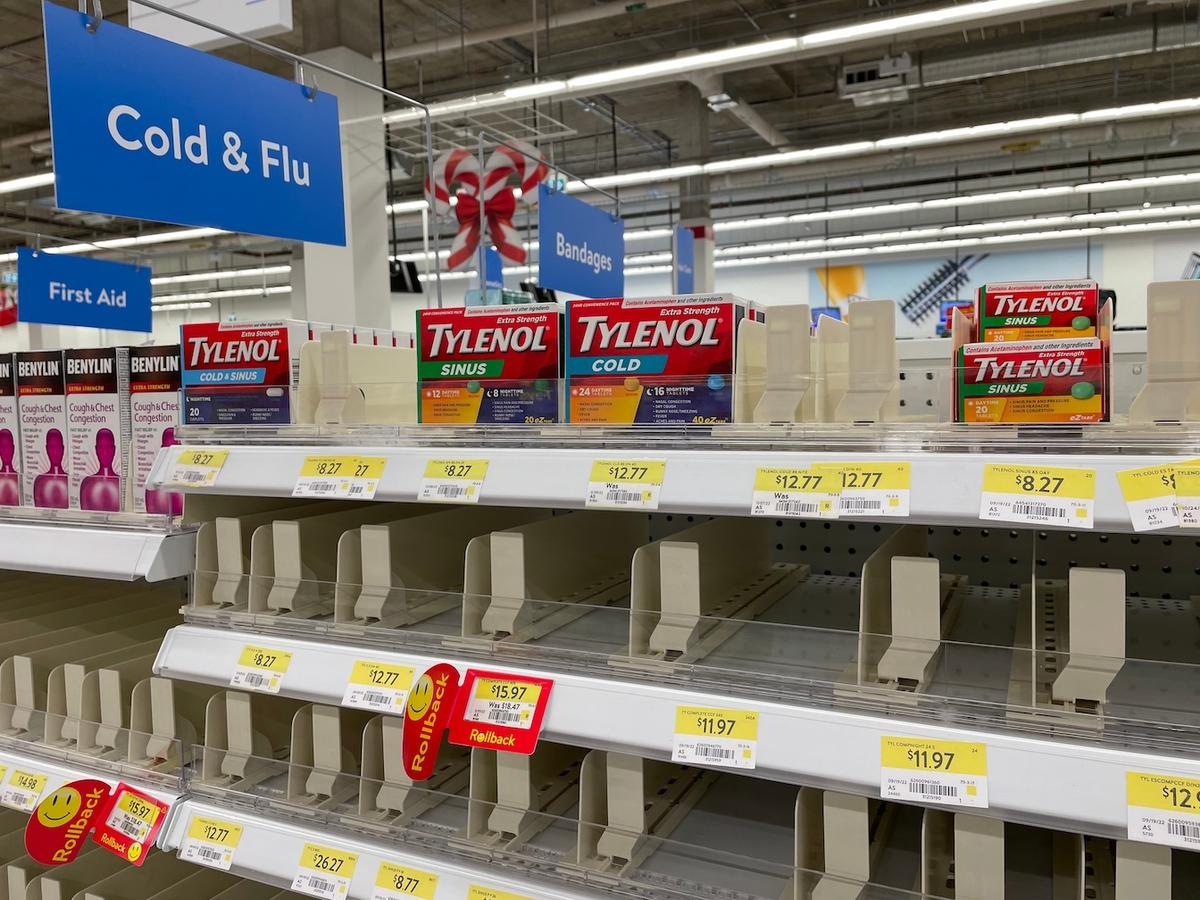 Empty shelves in a Walmart pharmacy due to supply shortages of cold, cough, and flu medication and increased demand due to seasonal illnesses in Edmonton, Canada, on Dec. 9, 2022. (Jenari/Shutterstock)