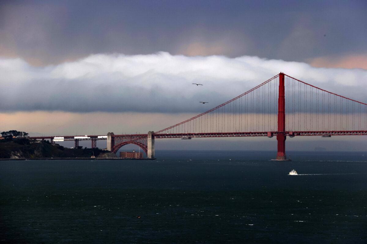 A weather system moves by the Golden Gate Bridge as seen from Alcatraz Island in San Francisco on Aug. 17, 2020. (Justin Sullivan/Getty Images)