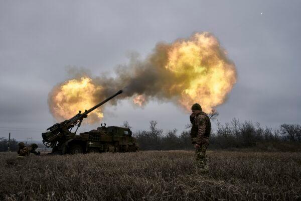 Ukrainian soldiers fire a French-made CAESAR self-propelled howitzer towards Russian positions near Avdiivka, Donetsk region, Ukraine, on Dec. 26, 2022. (Libkos/AP Photo)