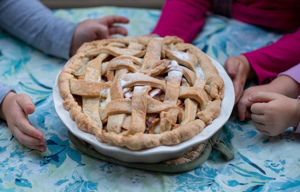 The author's raisin-apple pie, made with the help of little hands. (Dave Genders)