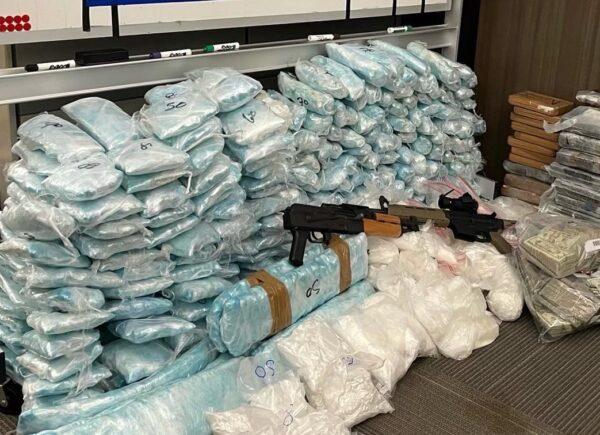 Fentanyl, firearms, and cash confiscated by DEA Los Angeles. (Courtesy of DEA Los Angeles)