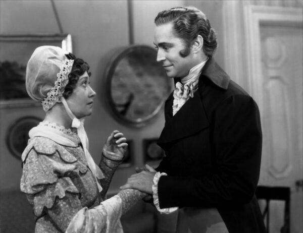 Susan Throssel (Fay Bainter, L) speaks with Valentine Brown (Franchot Tone), in “Quality Street.” (RKO Radio Pictures)