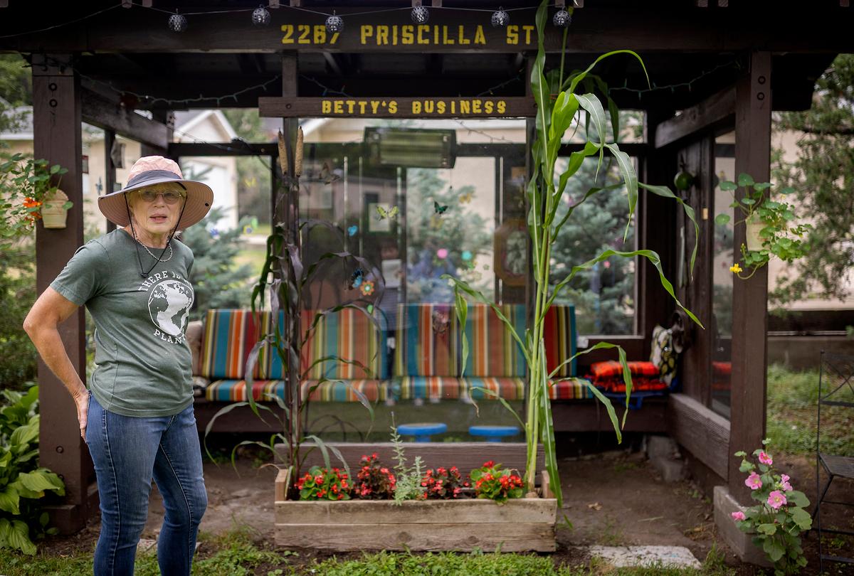 Betty Lotterman gives a tour of her backyard garden which houses an old bus shelter converted into a patio area in St. Paul, Minn., on Sunday, Aug. 14, 2022. (Elizabeth Flores/Minneapolis Star Tribune/TNS)