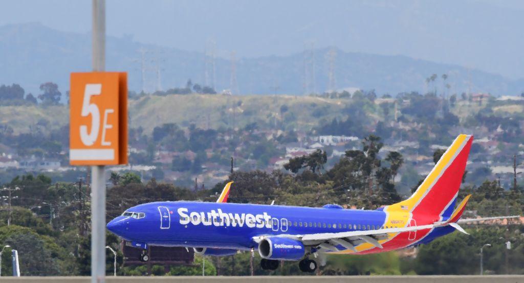 A Southwest Airlines airplane comes in for a landing at Los Angeles International Airport in Los Angeles, on May 12, 2020. (Frederic J. Brown/AFP via Getty Images)