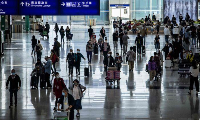 Amid Surge in COVID-19 Cases, China Lifts Quarantine Rules for International Travel